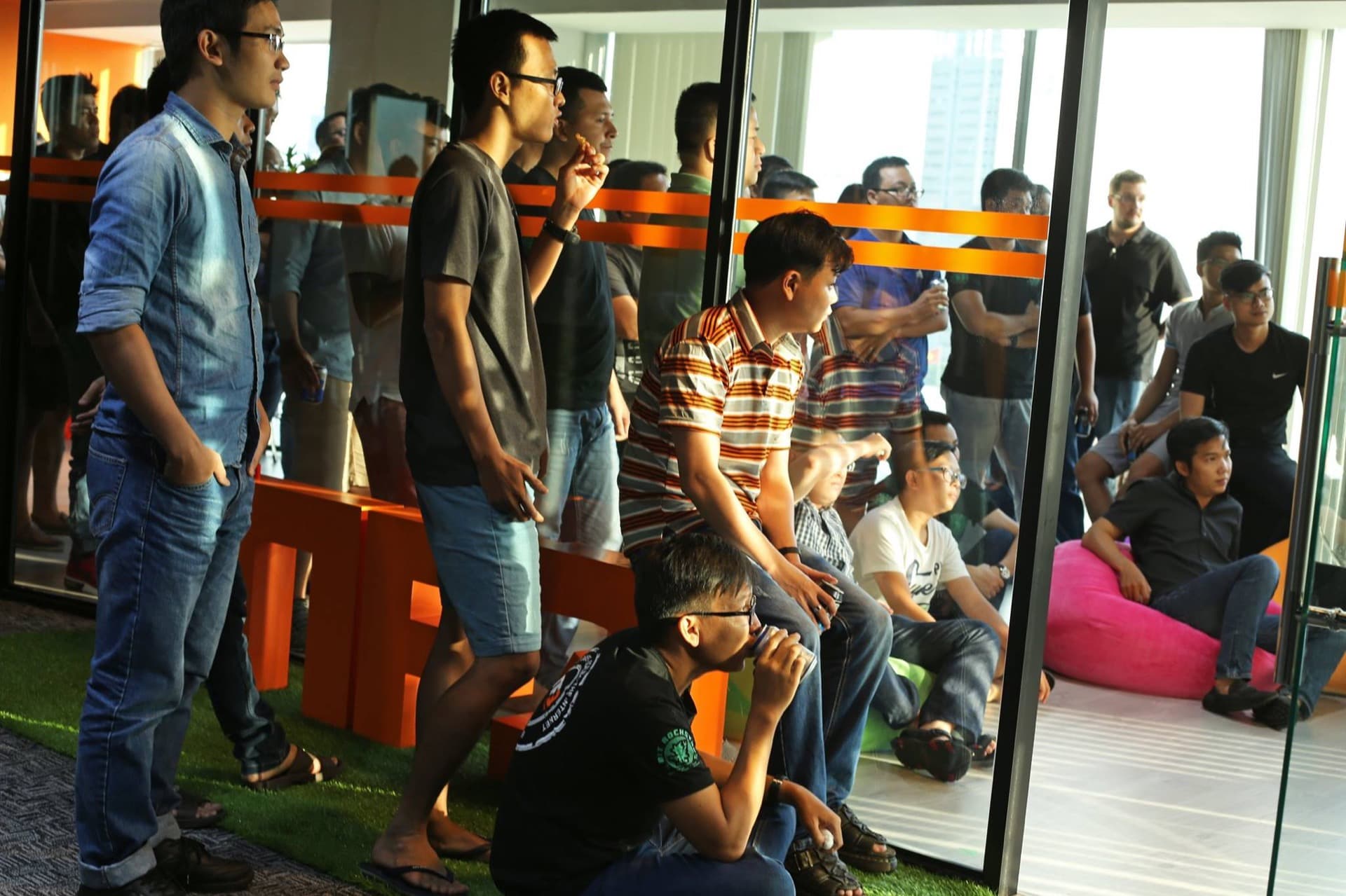 Nfq Office Event Crowd Watching Pitch
