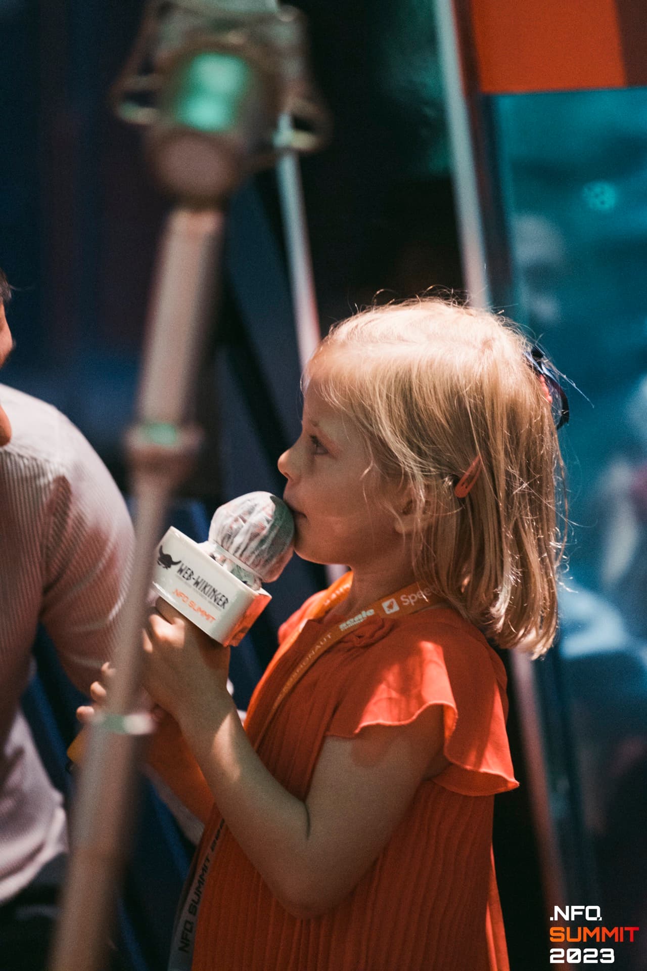 Nfq Summit 2023 Child Girl Orange Dress Mic Portrait