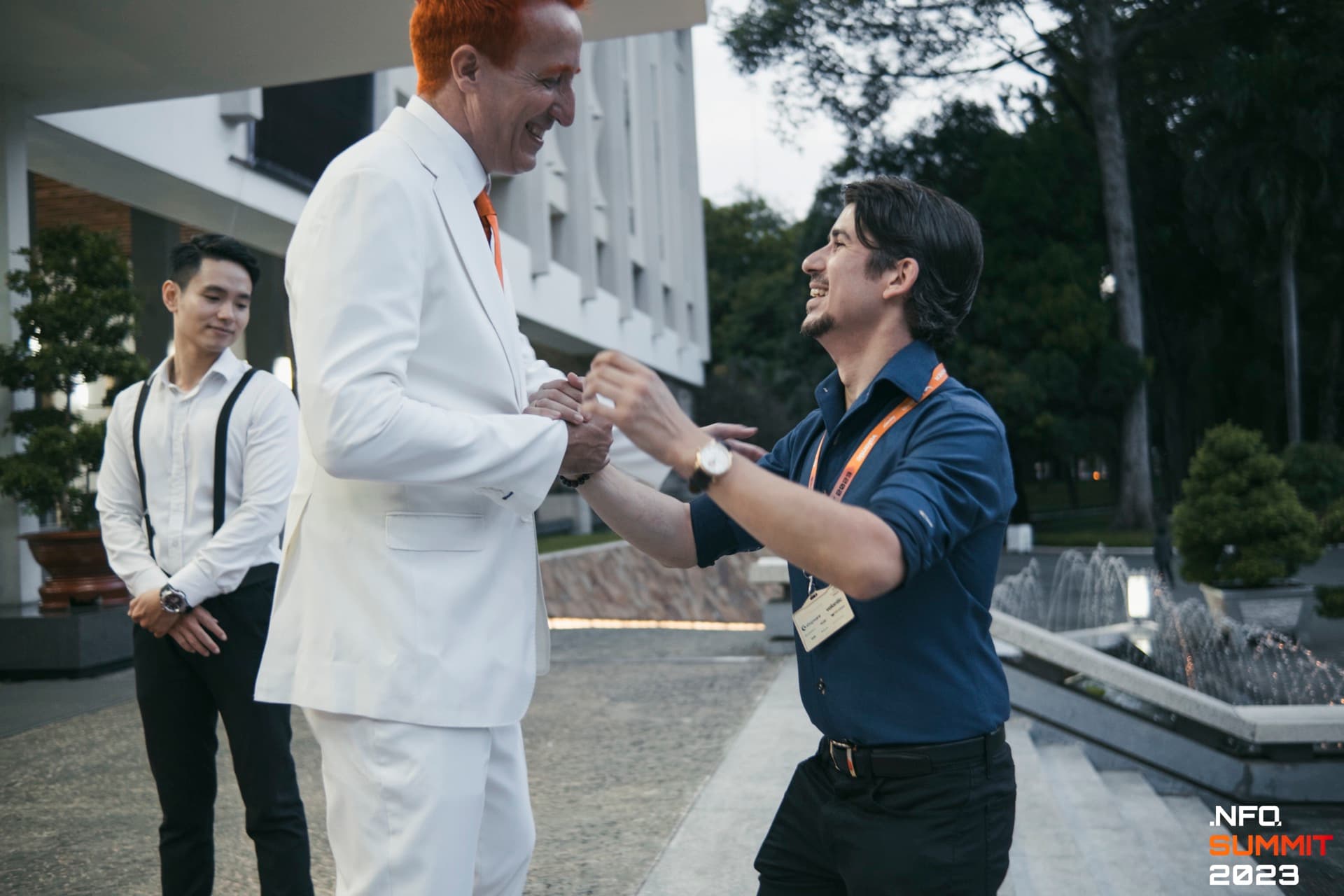 Nfq Summit 2023 Networking Handshake Outdoor 2