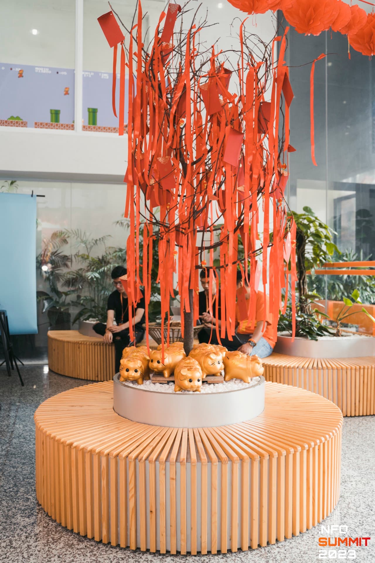 Nfq Summit 2028 Office Installation Red Ribbons