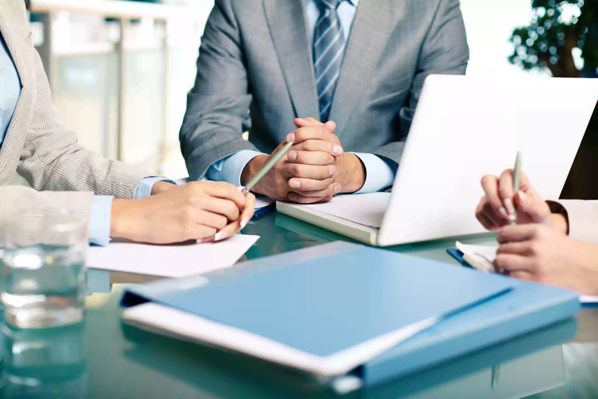 close up executives sitting table
