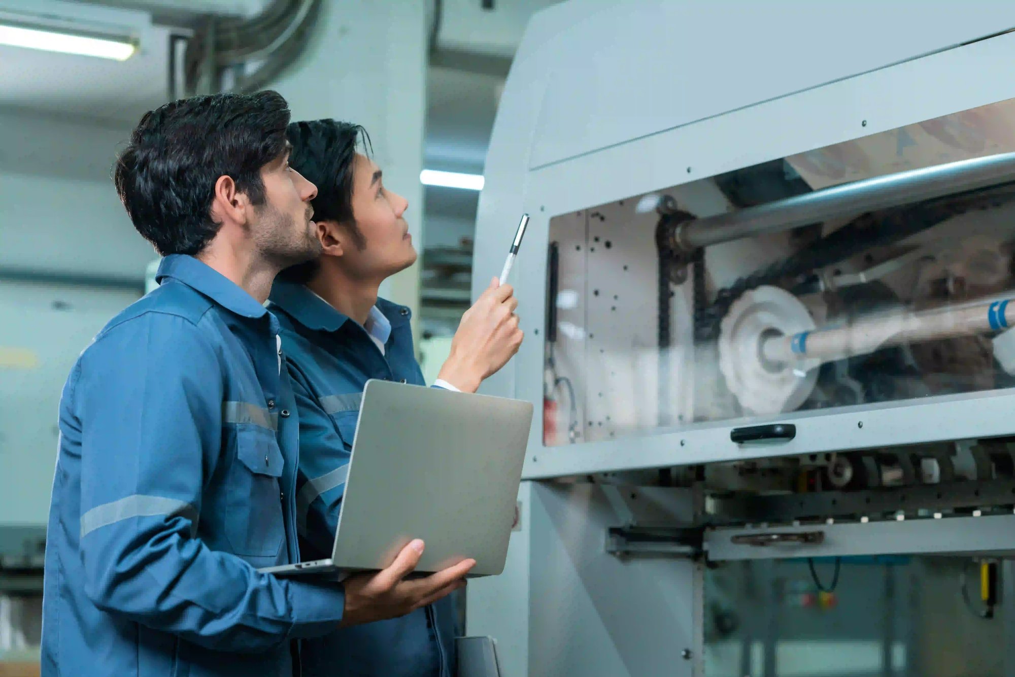 male-asian-caucasian-engineer-professional-having-discussion-standing-consult-machine-factory-two-expert-coworker-brainstorm-explaining-solves-process-cnc-operate-machine
